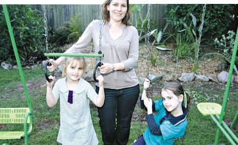 Bella Gray, right, with mum Sarah and sister Olivia, have some fun at home. Bella Gray, right, with mum Sarah and sister Olivia, have some fun at home.